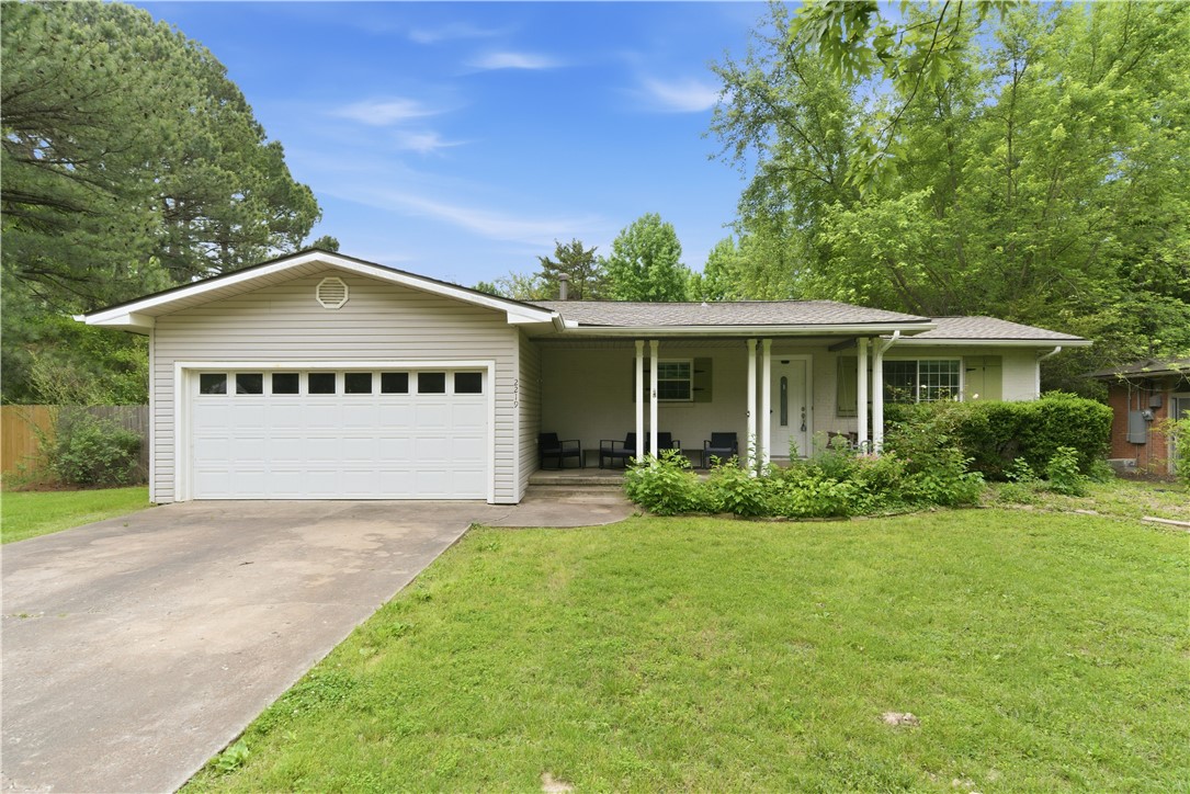 Charming Fayetteville investment opportunity near the University of Arkansas, Razorback Transit, I-49, shopping, dining, and downtown Fayetteville. This 4-bedroom, 2-bath home offers 1,336 sq ft, a 2-car garage, fenced backyard, front porch, back deck, and hardwood floors in the bedrooms. Recent updates include a new water heater in 2023 and a new roof in 2025. Currently tenant occupied through 7/31/2026, offering rental income in place with future flexibility in a cozy close-to-campus neighborhood.