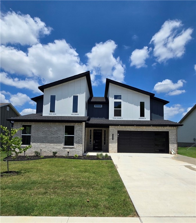 Discover a golf-front home in the new Pea Ridge neighborhood, The Greens at Sugar Creek. This property features 3 bedrooms, 2.5 bathrooms, a flexible office space, a large laundry room with storage, a mudroom, an open-concept kitchen, living and dining area, plus a 2-car garage. Premium amenities include custom cabinetry with high-quality stone countertops, LED lighting, a Nest thermostat, stainless steel appliances, full aluminum guttering, and more. Relish the tranquil views of Big Sugar Golf Course from your back porch. Its prime location offers easy access to all that Northwest Arkansas has to offer!