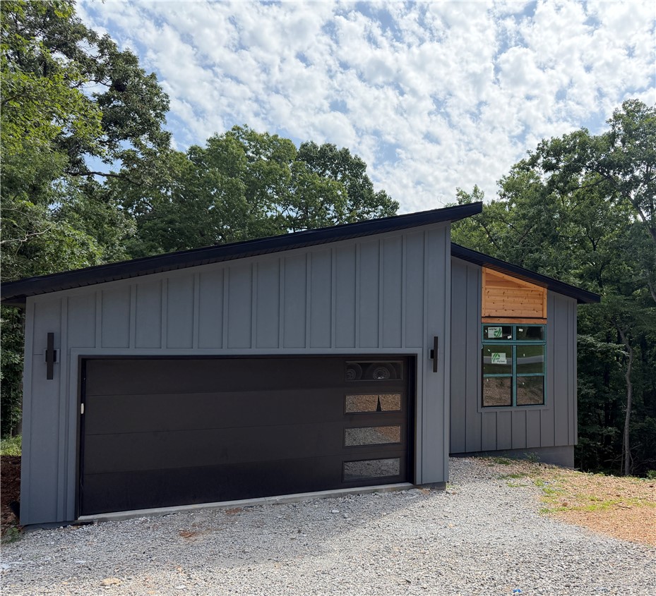 You'll LOVE this new construction home with a comfortable mid-century modern feel.  Features open plan with loads of sunlight streaming thru the windows.  Living room has shiplap, painted a lovely SW Naval Blue & electric fireplace to give warmth & ambiance on cool nights. Perfect kitchen for those who love to cook or wanting to learn!  Large island with room for bar stools, beautiful blue backsplash to compliment the Naval paint on the island and pair with the fireplace featured wall.  White quartz countertops make the blues POP.  Large walk in pantry, soft close drawers, doors & pull out trash can.  Covered deck off the living room.  Home has 2 bedrooms & 2 bathrooms.  Primary room features a custom wall also painted that perfect Naval blue, en suite bath with tiled walk in shower and walk in closet.  LVP thru out!  Right off Glasgow & simple to reach the new bike/walking path that was just cut in on Glasgow.  Minutes away from Branchwood which features pickleball, gym, disc golf & playround & MUCH MORE!