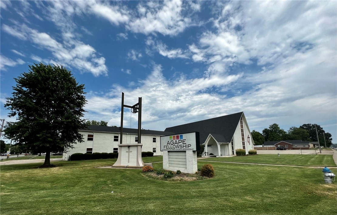 Unique opportunity to purchase a fully functioning church building, community center, or repurpose for your specific need. This property is located on a hard lighted corner in the middle of Springdale, AR and features 2 parcels totaling 5.98 acres and a 15,418sf church. The church east office building is 2 stories with restrooms on each floor and 16+ offices. The west building is two stories with a large fellowship hall, full kitchen, and 2 bathrooms. The second story has a large meeting/rec room and a large office. In between the two buildings is a 320 person(subject to fire code verification) sanctuary. The church is contained on 1.1 acres leaving 4.88 acres for immediate development. 4.88 acres currently zoned single family but the city has shown interest in allowing MF12 zoning.
