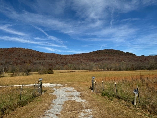 Camping, hunting and ATV riding paradise. Located directly off of Hwy 16 E with river frontage.  Electric, water at street. River frontage for fishing and swimming.  6 miles and 13 minutes from Mill Creek Trailhead. 1.3 miles from Combs Store. Open pasture land. Additional 17 acres could be purchased. See Mls listing 1290870