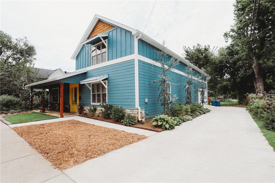 Custom home with fantastic finishes throughout! Built in 2017, located less than a 5 minute walk to the Bentonville Square! Filled with natural light by oversized windows, solid wood doors, a chef worthy kitchen features Dekton stain & impact resistant composite counter tops, gas cook top
Two bedrooms & 2 baths on the main level, two bedrooms and a bath up. PLUS studio apartment for mother-in-law or Airbnb. There is a greenhouse in the backyard, with heater for the gardener! Main level handicap access.