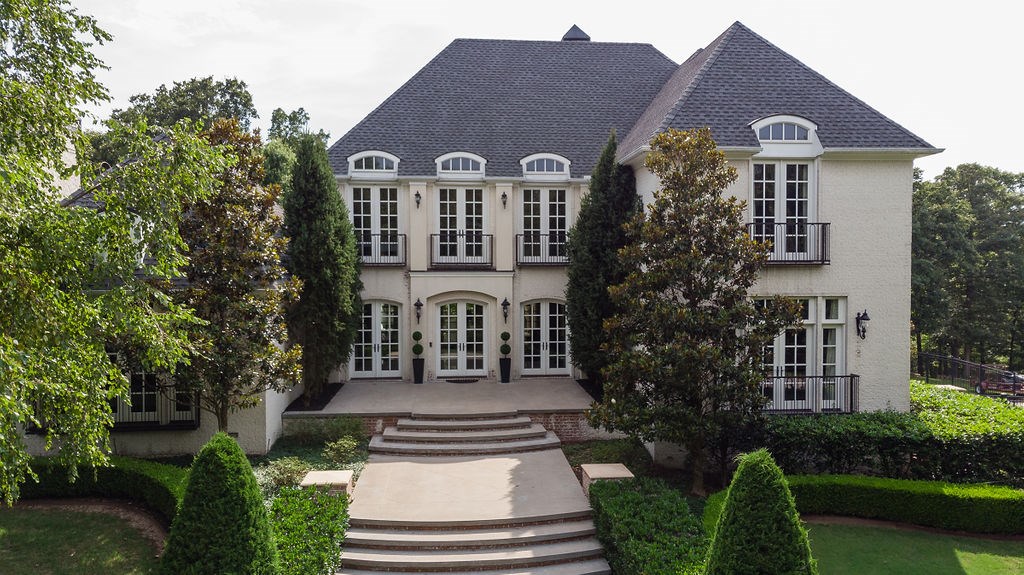 Classic elegance awaits you at this home in the Estates at Dogwood Canyon. Enter this home through beautiful French doors and step on to the luxurious marble floors that lead you into a formal living room and dining room. The 2 arched entryways will bring you to the kitchen and breakfast area. High end stainless steel appliances include 2 dishwashers, trash compactor, 6 burner gas stovetop with griddle, pot filler and built-in oversized GE refrigerator & freezer.  French doors leading to outdoor private courtyard area and a    master bath that boasts heated marble floors, double vanity with layered marble, walk-in shower with dual shower heads, exquisite walk-in closet and more. Enjoy the beautiful outdoors on the main covered patio with gas fireplace and built-in fountain. Entertain in the covered outdoor kitchen area with stainless steel ice-maker, granite counters & built-in grill!