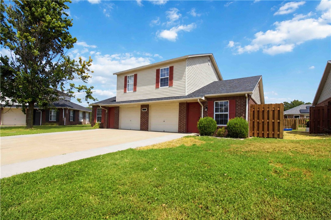 Excellent investment opportunity in a convenient Bentonville location! This duplex features two spacious units, each offering 2 bedrooms, 2 bathrooms, and an attached 1 car garage. One side is currently rented and the other side is recently updated and move in ready. The functional floor plans provide comfortable living space, while each unit's private garage adds valuable parking and storage. Located just minutes from Downtown Bentonville, the Walmart Home Office, shopping, dining, and Northwest Arkansas' extensive trail system, the property is ideally positioned to benefit from the area's continued growth. Whether you are expanding your rental portfolio or looking for the opportunity to live in one unit while renting the other, this Bentonville duplex offers flexibility, convenience, and strong long term potential.