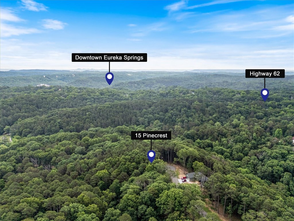 Ready, set, build!!! With this large wooded lot you will have ample privacy tucked in at the end of the cul-de-sac. Lovely and quiet, this single street subdivision has many conveniences like all underground electric, gas, cable, city water and sewer all on on a gorgeous tree lined and paved street. For most, when building a dream home, in a newly laid out neighborhood you want some security that your home will be among others of its same caliber. Rest assured. The first few completed homes on Pine Crest are large and lovely homes with high quality construction and high end materials. This is a neighborhood you will be proud to call home. Eureka Springs has so much to offer. You are just a few minutes from downtown shopping, dinning and entertainment. Beaver lake and the new Opera in the Ozarks campus is a short 20 minute drive on HWY 62 West. Rogers and Bentonville are about 45 minutes as well as Branson to the North. Come see what all the fuss is about here in Eureka...you won't ever want to leave.