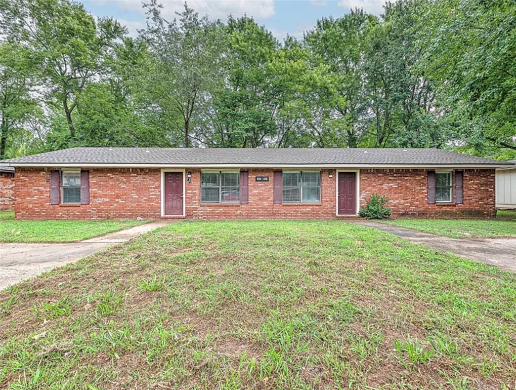 Perfect investment property right in the heart of Fayetteville! Remodeled 2BD/1BA per side duplex with new flooring, paint, refinished cabinets, new counter tops throughout, and new lighting & plumbing fixtures. New kitchen appliances including refrigerator, dishwasher, and range. Washer / dryer hookups. The left side has a new patio slider. The right side has newer Heat and Air units. New Water heater!