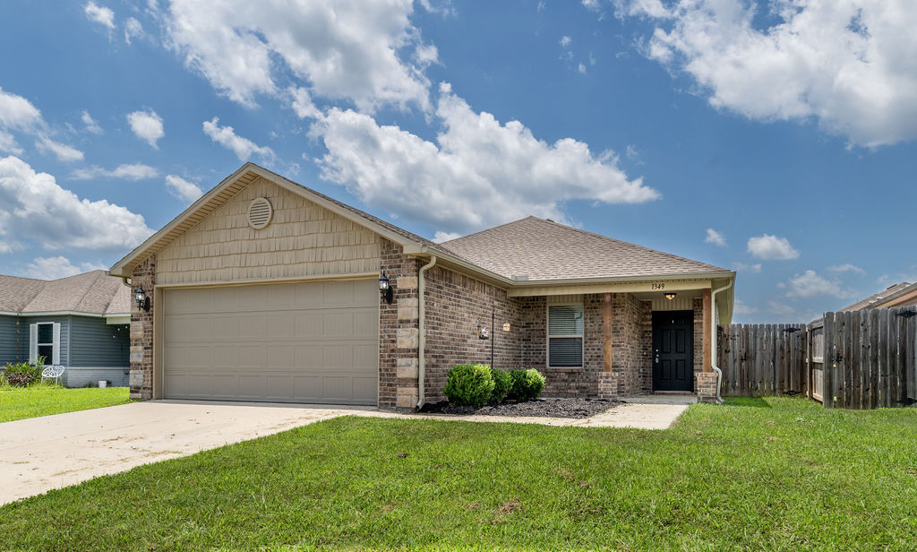 The one you've been looking for! Tucked into a quiet, established neighborhood, this well-maintained 3-bedroom, 2-bath home offers exceptional convenience in the heart of Fayetteville. Just minutes from the University of Arkansas, Baum-Walker Stadium, Fayetteville High School, the historic Downtown Square, Dickson Street, parks, bike and walking trails, shopping, restaurants, and grocery stores-- you'll be close to everything Fayetteville has to offer. Whether you're searching for a primary residence, your first home, a place to downsize, or an investment opportunity, this property checks all the boxes. With strong rental potential of $1,800+ per month, it's an excellent option for investors, while its functional layout and central location make it equally appealing for homeowners. It's not often you find this combination of location, convenience, and value!