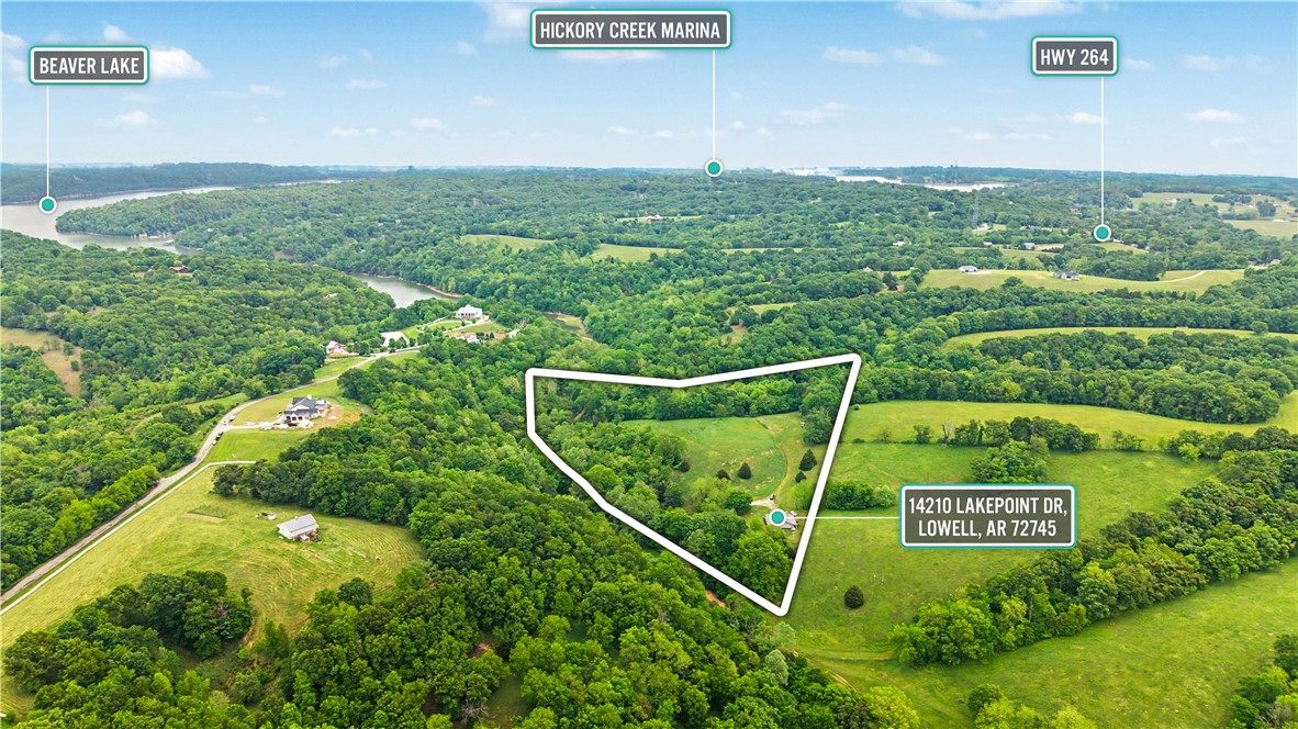 Discover 11.5 acres of breathtaking natural beauty with panoramic Beaver Lake views in a peaceful, secluded gated community. Tucked away at the end of the road, this rare property offers privacy, serenity, and multiple ideal building sites for your dream home. A spacious 40x50 barn/shop includes 440 sq. ft. of living quarters, perfect for guests, a weekend getaway, or temporary living while you build. Utilities are already in place with water, electric, and septic perc available. A wet-weather creek borders two sides of the property, adding to the tranquil setting. Whether you’re looking for a private retreat or the perfect place to build your forever home, this property offers stunning views, convenience, and endless potential.
