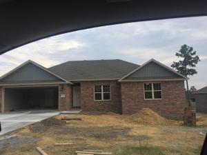 NEARLY COMPLETE AND READY FOR FIRST OWNER well-designed 3 bedroom, 2 bath  brick home. Features an open floor plan, spacious kitchen and large living area.