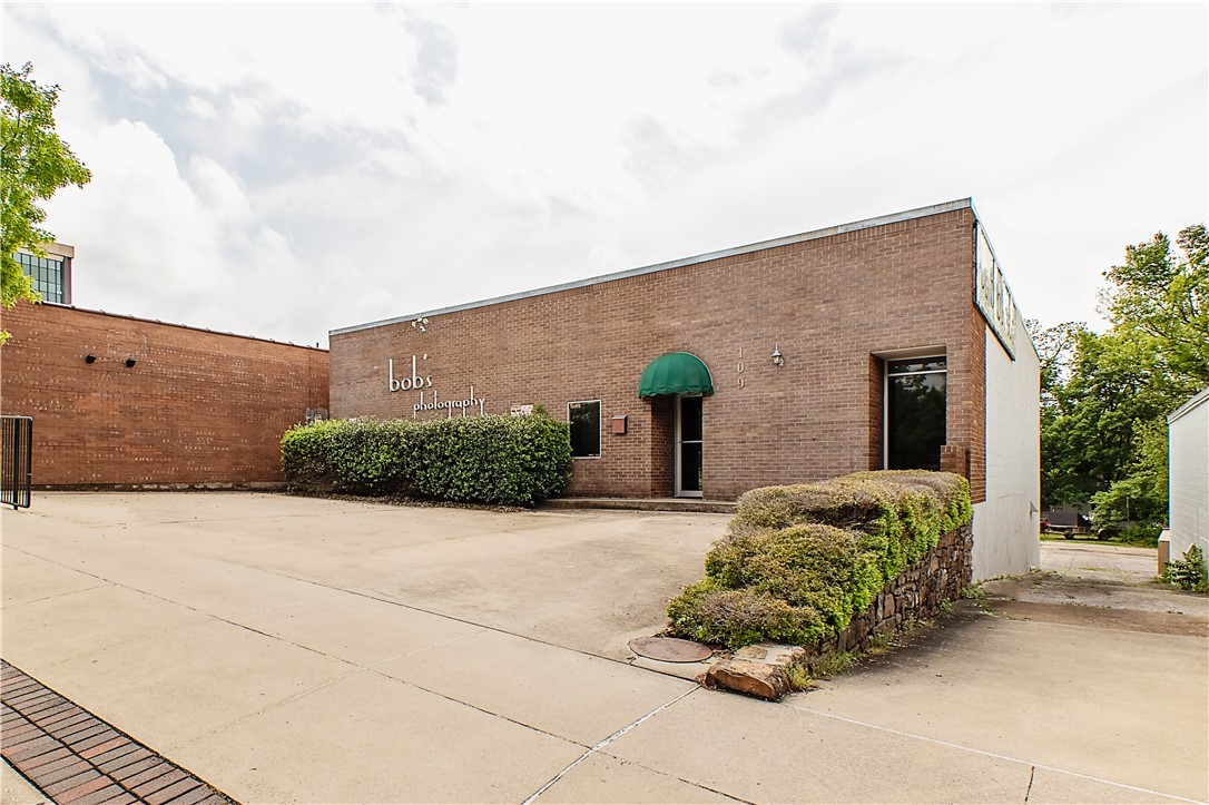 This commercial building is in great condition and is in the middle of the fast growing entertainment district of Fayetteville.  This commercial building is ready for your architectural designs and offers many possibilities.  Finding parking in the front and back of a commercial building in the entertainment district is hard to find and this property offers plenty of parking.  With 3686 sq. ft., this property offers endless possibilities.  Propert is being sols as is where is.