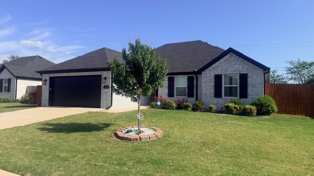 Great home, nice upgrades close to Farmington Schools.  Wagon Wheel Crossing Subdivision Phase 1.  Beautiful 3 bedroom 2 bath, covered back porch, stainless appliances, good sized  lot, all brick, gas log fireplace, walk in shower with 2 closets in main bedroom.  You will not be disappointed, perfect location to all Northwest AR has to offer.