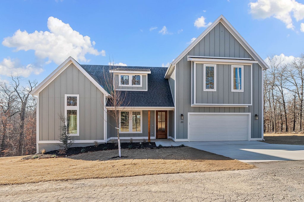 Welcome home! Discover the refined charm of modern farmhouse living in this newly constructed residence, thoughtfully crafted by a distinguished local builder. Designed with open-concept concept that seamlessly blends rustic warmth with chic, contemporary finishes. The heart of the home- large kitchen featuring a pantry, a waterfall prep island with quartz countertops & a gas range. Kitchen sink overlooks the backyard and has a dedicated side bank of buffet cabinets for extra storage. The living room, centered around a fireplace with mantle, is lit up by elegant champagne gold lighting. Living room transitions to a 10x16 covered back deck, complete with a gas hookup—perfect for entertaining. The primary retreat offers a spa-inspired ensuite with a soaker tub, a fully tiled walk-in shower and a generous walk-in closet. Upstairs, discover a versatile 13x15 bonus landing, a dedicated home office, two guest bedrooms & full bath. Located minutes from Bella Vista’s world-class mountain bike trails, golf, and lakes.