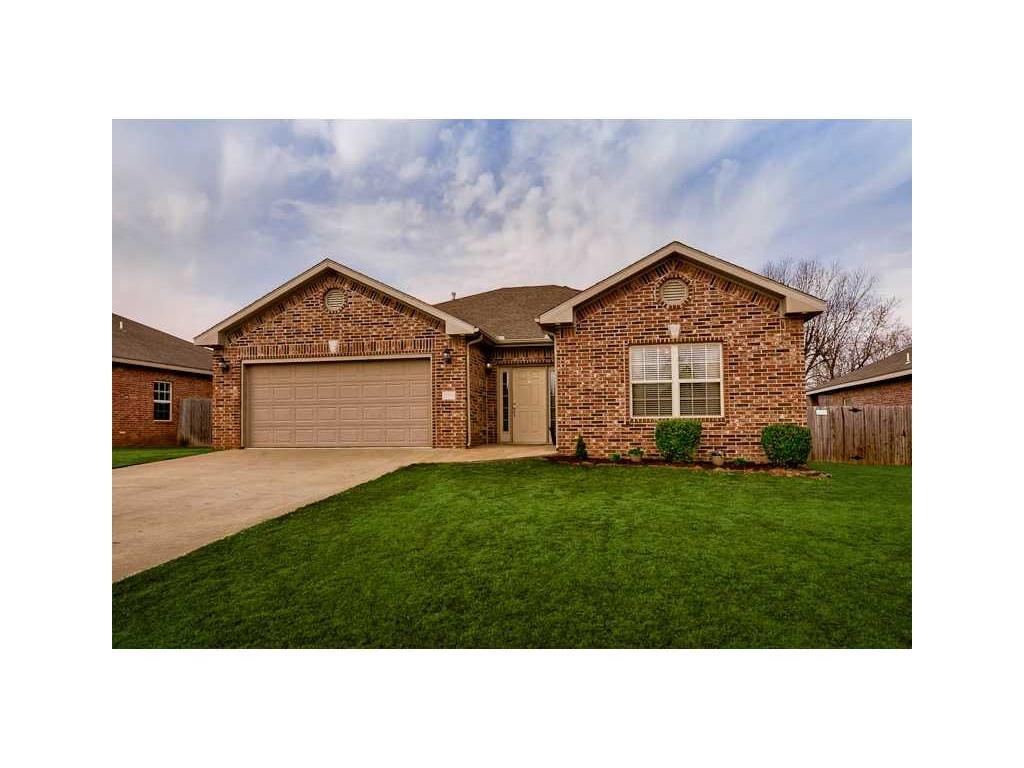 Great home just minutes from downtown Bentonville, Walmart home office and I-49, this 3 bedroom 2 bath home has split floor plan, gas fire place in living room, granite counters, master bath has separate whirlpool tub and shower, fenced yard with extra large patio area and includes refrigerator, washer and dryer.