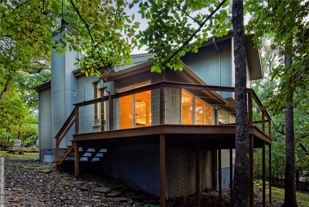 UNIQUE, ONE OF A KIND, tri-level contemporary located @ end of a cul-de-sac in popular Huntingdon S/D! Open plan boasts sunken family room w/wood burning fireplace, soaring cathedral ceilings, bamboo & cork floors, mahogany wood paneled walls, media room, slate wine cellar, sun room & elevated deck. Granite, stainless kitchen features Jenn Air gas cook top w/downdraft & convection oven. Huge master w/study + bath w/double vessel sinks, travertine shower & jetted tub. MUST SEE! CHECK OUT THE VIRTUAL TOUR!