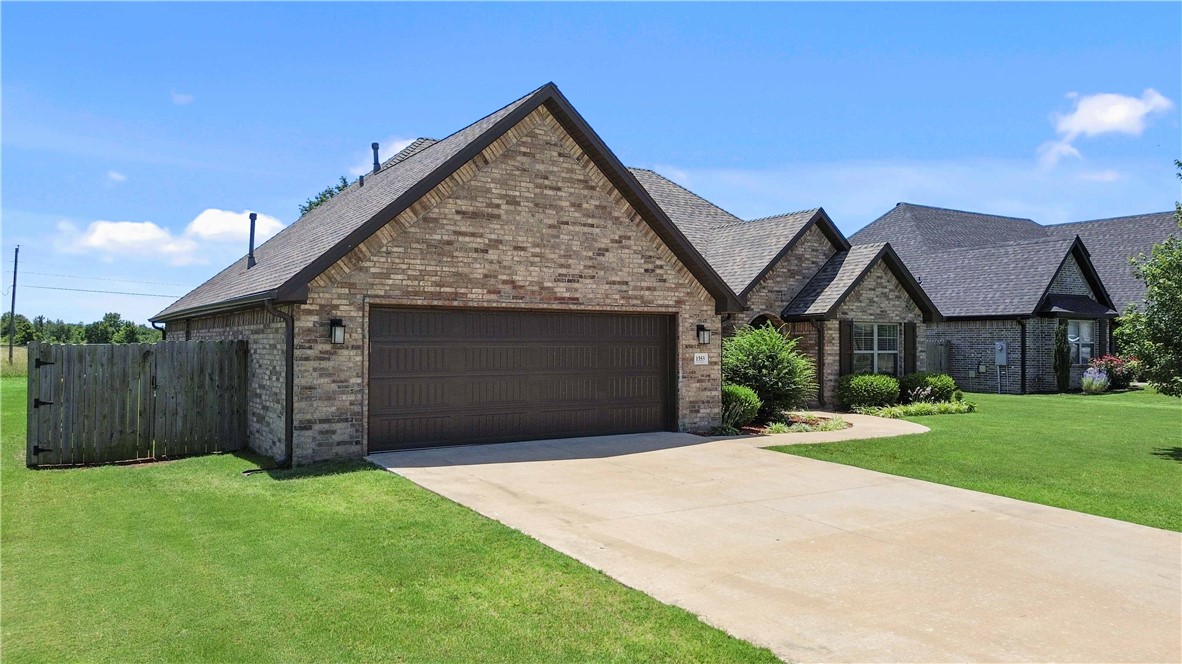 Enjoy the perfect blend of space, comfort, and convenience in this beautifully designed home located in the desirable West Springdale/Tontitown area. Situated on an oversized lot with a peaceful, rural feel, this property offers 4 bedrooms, a dedicated office, 3 full bathrooms, and a 2-car garage. The spacious primary suite features a large walk-in closet, private water closet, jetted tub, and separate tiled walk-in shower. The open-concept layout showcases vaulted ceilings and surround sound in the living room, creating an inviting space for everyday living and entertaining. The kitchen is equipped with granite countertops, a walk-in pantry, and ample workspace. Wood-look tile flooring extends throughout the living areas, providing durability and style. Step outside to the covered back porch overlooking the spacious backyard, complete with mature cherry trees. Additional features include attic storage and oversized lots that provide extra space, privacy, and a rural atmosphere rarely found this close to town.