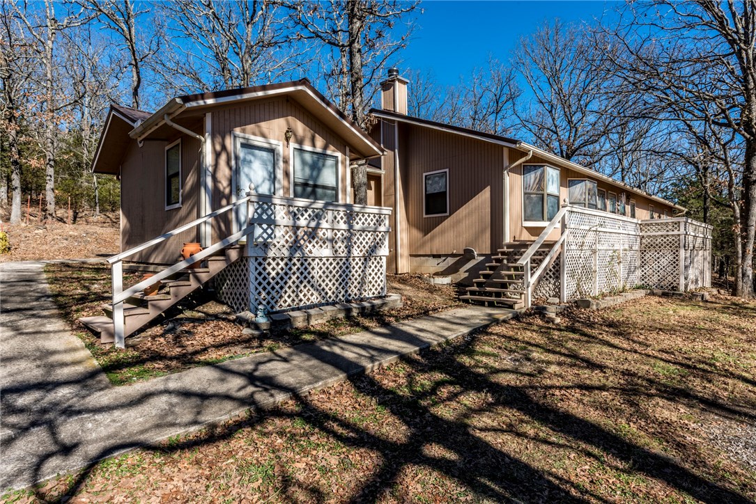 Beautiful 2265 SqFt home, 3 bedrooms, 3 baths, located in Elkins!! This house features a raised deck, large bay windows, a large kitchen with pressed wood counters, large open rooms with natural lighting, large bedrooms, a beautiful 391 SqFt barn, and a large yard with mature trees! This home is minutes away from Lake Sequoyah Park and the White River perfect for fishing! You won't want to miss out on a home like this!