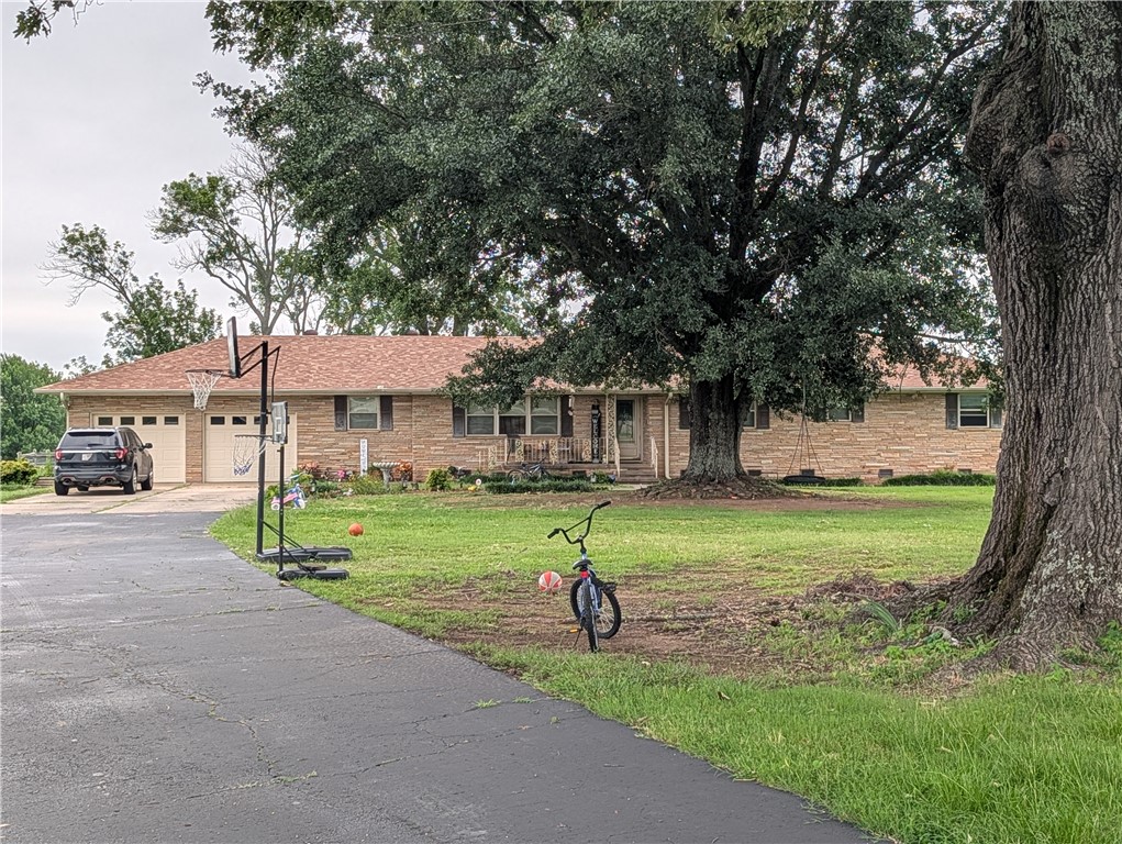 INVESTOR OPPORTUNITY – 55 Acres with Home and Future Development Potential. Don't miss this exceptional investment opportunity in Kibler! This 3-bedroom, 2-bath home sits on approximately 55 cleared acres in a highly strategic location near the planned route of Interstate 49, offering tremendous future development potential.

The property is currently tenant-occupied, providing immediate rental income. The home features a spacious and functional layout with large bedrooms, a separate living room and den, and a gas-log fireplace.
With its location and acreage, this property could be ideal for future commercial development, a travel center or fuel station (subject to zoning and approvals), residential subdivision development, agricultural use, or continued investment as an income-producing property.

The possibilities are extensive for investors, developers, and entrepreneurs looking to capitalize on the area's anticipated growth.