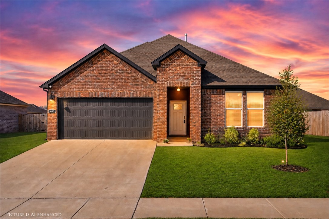 Located in Goose Creek Village, just off Wedington and Double Springs, this well-maintained home is minutes from Farmington Jr. High, shopping, dining, and quick access to I-49. The oversized island featuring quartz countertops is the centerpiece of the wide-open floor plan, connecting the spacious kitchen, dining, and living areas that is ideal for everyday living and entertaining. The primary suite is generously sized, offering room for a sitting area and an ensuite bath featuring double quartz vanities, a walk-in shower, and a large walk-in closet. Additional features include LVP flooring throughout, an electric fireplace, and a tankless hot water heater so you don’t run out of hot water during those long showers. Convenient to Navona Pizza, Briar Rose Bakery, El Matador, Walmart, Aldi, and more just down the road. Enjoy this already developed neighborhood that is quiet and family-friendly, with low traffic, no active new construction, and move-in ready convenience.