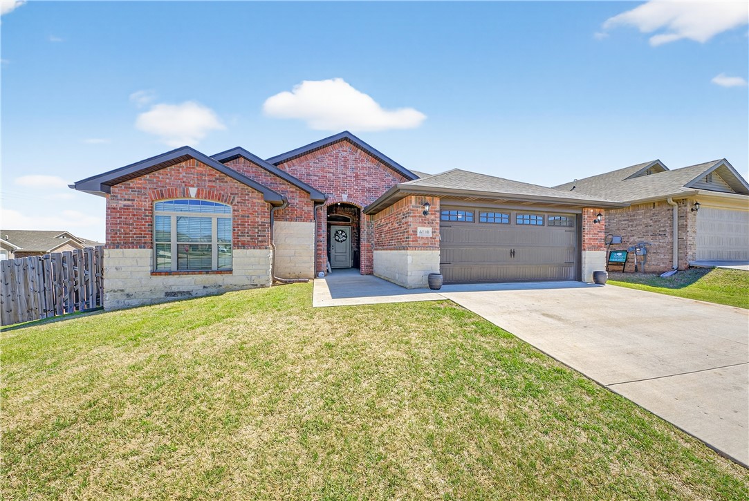 This energy efficient home sits on a desirable corner lot and offers room to live, gather, and grow. From the moment you walk in, you’ll appreciate the expansive, open living area centered around a cozy brick fireplace—perfect for hosting or relaxing. You’ll love the abundant cabinetry in the kitchen, generous storage, & large island —ideal for everyday living or entertaining. Granite countertops run throughout, and the dining area easily accommodates a large table, making it perfect for gatherings. The spacious primary suite is a true retreat, featuring a boxed ceiling and a well-appointed bath with dual split vanities, a soaking tub, custom tile shower with seating, and a large walk-in closet. The smart split floor plan offers two secondary bedrooms and a full bath at the front of the home, while a private 4th bedroom and third full bath are tucked away—perfect for guests, a home office, or multigenerational living. Step outside to enjoy the oversized, partially covered patio and fully fenced backyard.