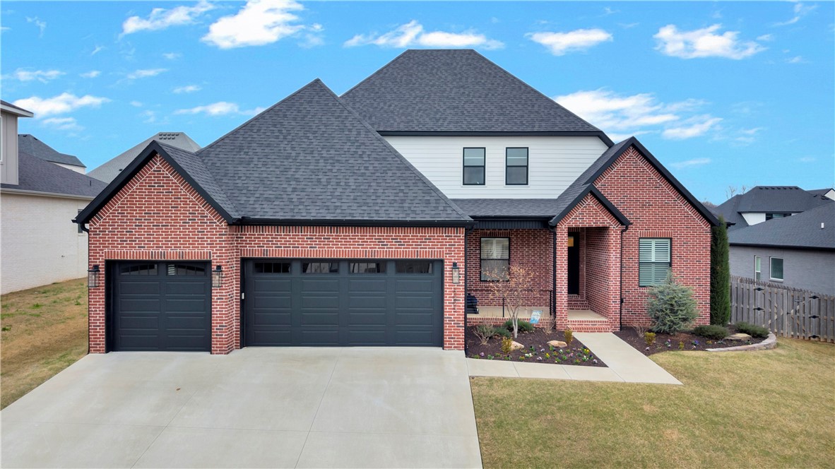 Experience luxury living in the desirable gated community of Shadow Valley! This stunning home features a bright, open layout with soaring coffered ceilings, rich hardwood floors, and a striking fireplace that anchors the spacious living area. The beautiful eat-in kitchen is designed to impress with custom cabinetry, a large quartz island, stainless steel appliances, and stylish lighting—perfect for both entertaining and everyday living. The main level offers a primary suite with a spa-inspired bath, plus three additional bedrooms, while the upstairs bonus room provides endless possibilities for a media room, game room, or guest retreat. Step outside to your private backyard oasis featuring a screened-in patio with fireplace and a heated saltwater pool—perfect for relaxing or entertaining year-round. Enjoy all that Shadow Valley has to offer including a community pool, fitness center, restaurant, lounge, basketball courts, playgrounds, and fishing ponds.