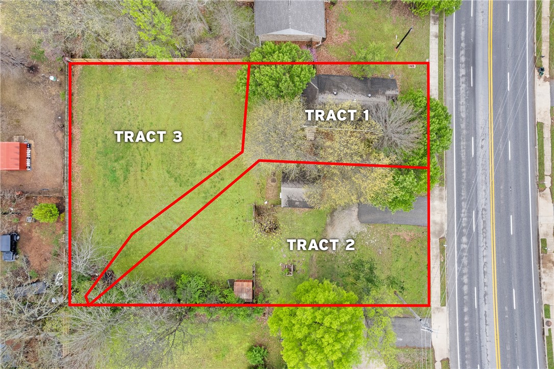 Welcome to your next development opportunity. This property offers just over half an acre of land and is
zoned Community Services, allowing for a wide range of uses including commercial, single-family, or
multifamily development. The current setup includes a 2-bedroom, 1-bath home with nearly 1,100 square feet, plus two additional vacant lots. The rear lot is well-suited for a single-family home, while the front lot has potential for a duplex or commercial use. Whether you're looking to build, invest, or develop, this property offers the flexibility to make your vision a reality. **Also listed as residential with MLS # 1303116.**