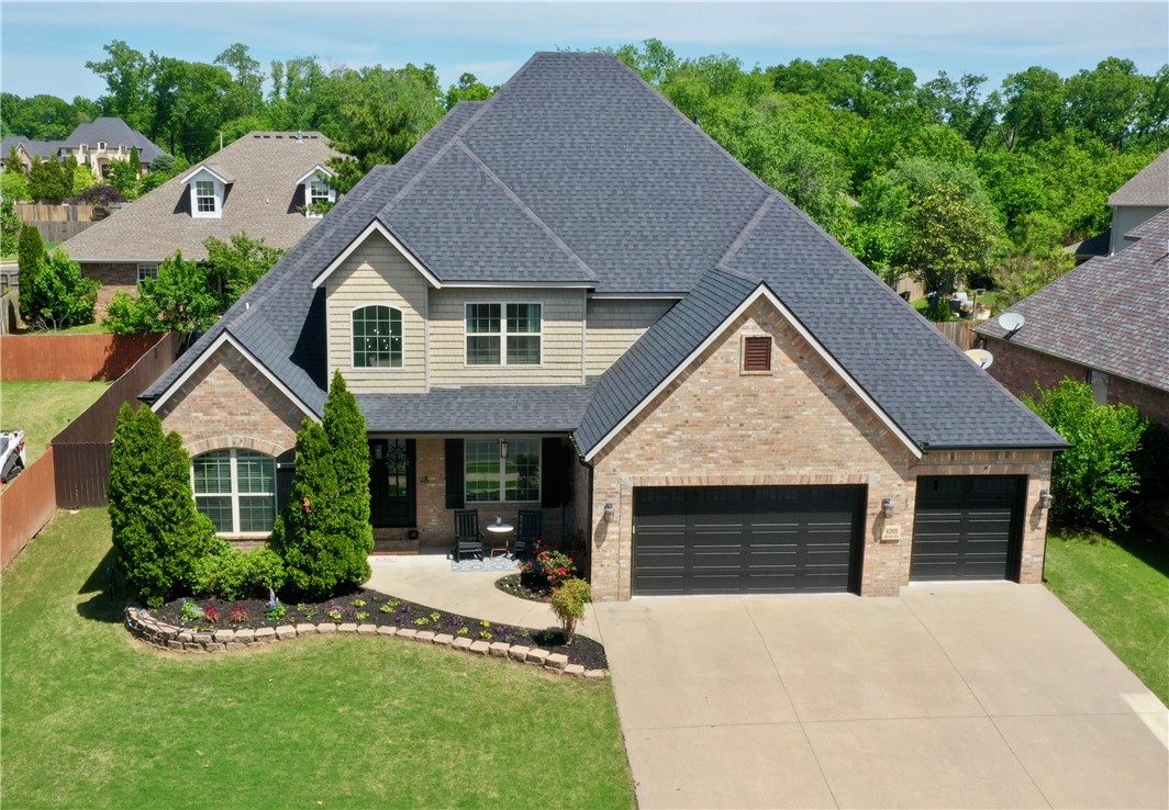 Fabulous NE Bentonville home in the highly sought Kensington subdivision. Enjoy the convenience of close proximity to I-49, DTB, Crystal Bridges and the WM campus. The grand entry invites you into the spacious and bright living and dining areas. Closely connected are the family room and eat-in kitchen, featuring a large center island, 5-burner gas cooktop, microwave, built-in oven, stainless appliances and granite countertops. The main level also hosts the laundry room with utility sink, a full bath, an office with an affixed Murphy bed, as well as the primary suite, which boasts two separate closets and vanities, walk-in shower, whirlpool tub and private water closet. Two staircases lead to the second level, which accommodates two secondary bedrooms that share a Jack & Jill bath with dual sinks, a third bedroom with an ensuite bath, as well as the bonus room. Your outdoor retreat awaits with a covered patio and firepit area to relax. Other amenities include a storm shelter and tankless water heater.