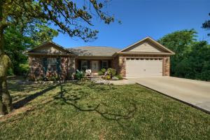 1625 square foot house with an extra 400 heated and cooled square feet in the 1500 square foot shop!Own a home based business? Looking for some extra storage? Need a break from the kids every now and then? This home is for YOU! This beautiful three bedroom / two bathroom home sits secluded on  1.5 acres just outside of the city limits. The granite counter tops, beautiful hardwood floors, and tray ceilings set it apart from similarly sized homes. This gem features a very versatile 30'x50' detached shop with over 400 additional feet of heated and cooled space! The shop can be used as a game room, warehouse, office, craft room or even an additional bedroom. Additional parking spaces and a covered lean-to area next to the shop give you plenty of room to store your treasures!