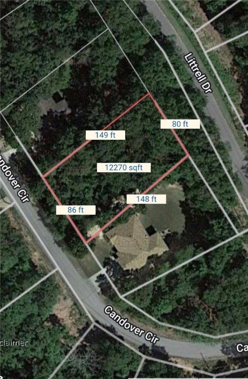 Centrally located wooded lot on private road between Lake Brittany & Lake Ann. Back 40
Trails around the corner. Everything is minutes away!