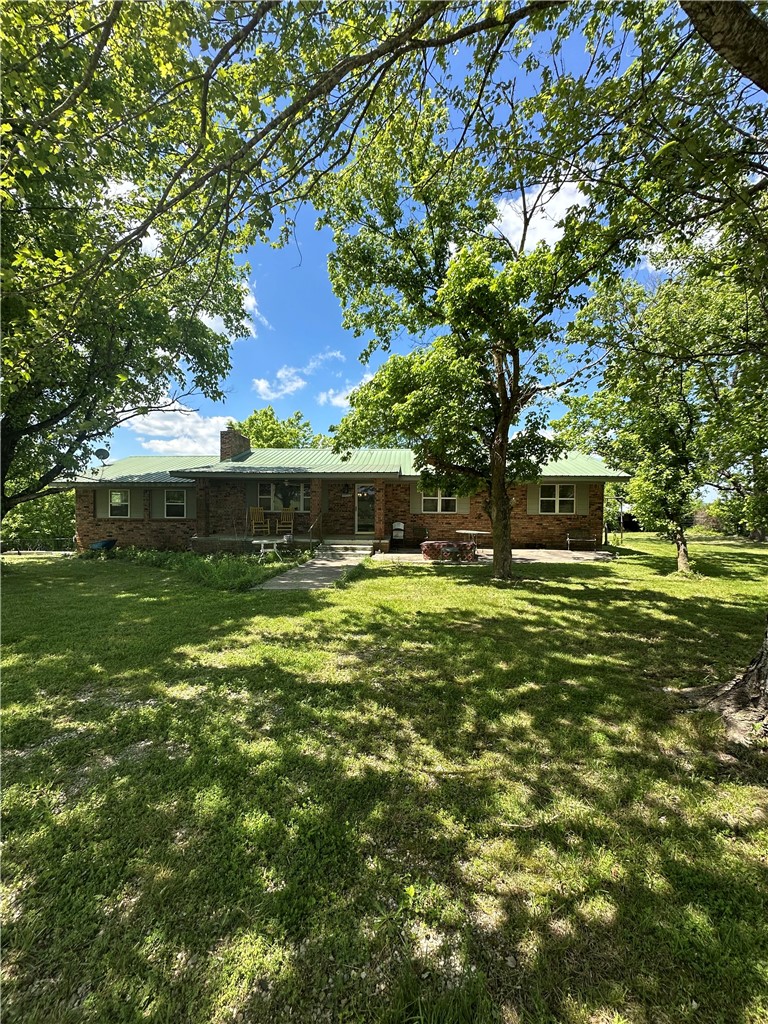Opportunity awaits in the heart of the Ozarks with this unrestricted 11.25 acre farmstead featuring a large brick home with over 3500 sq ft. potential living space and no restrictions. Outdoor enthusiast will love the location, as Compton Trailhead attractions such as Hemmed in Hollow, Granny Henderson's Cabin and easy access to horse trails and hiking trails are just right out your back door! With two ponds, a year round spring, and cross fencing; bring your horses or cows and your vision to take advantage of the rare opportunity to own acreage in one of Arkansas' most sought after locations in the upper Buffalo National River area.