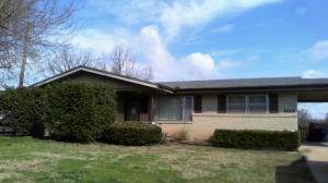 REDUCED - Nice brick and vinyl home with full basement.  210 square foot sun room not include in square footage.