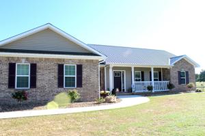 Beautiful new home on 11.28 of the most scenic acres you can imagine with a huge 140x40 shop, pond, fencing, and great country views!  Inside you will find a wonderful open floorplan with great storage, a lovely rock fireplace, office, beautiful master with garden tub and walk in shower, and more!  This beautiful property is the perfect choice for the family trying to get out of town!