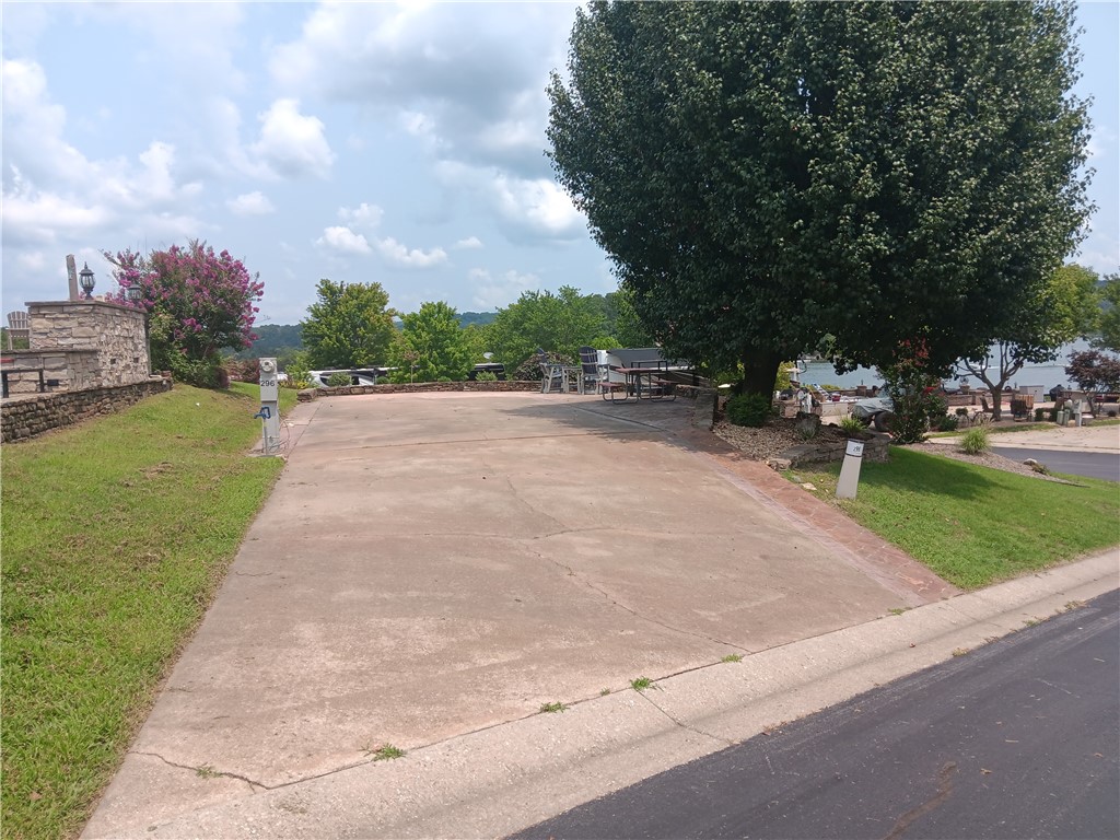 Campfires, cookouts and the most amazing sunsets you've ever witnessed at the lake! Build the kind of memories here that will last more than just the summer months. You wont regret your next campout with the family on this oversized corner lot with extended patio. Lakeview's are just the start, bring your kayak, your fishing pole and those roasting sticks, its time to celebrate the little things at Table Rock Rock Lake. Take the 30 minute scenic drive to Branson for dining, shopping and entertainment or spend a relaxing day on the boat with a stop at one of several boat up restaurants