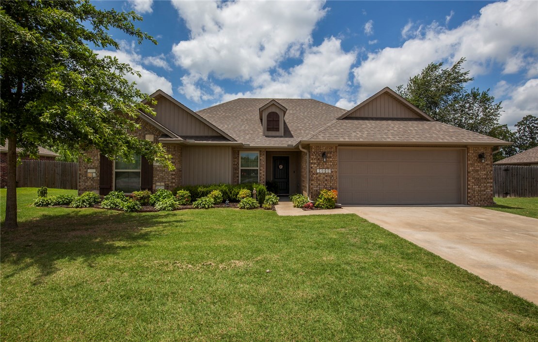 Great 3BR/2BA/2 Car-garage home with split floor plan. Features spacious living room with wood floors, high ceiling, gas fireplace, eat-in kitchen with ceramic tile, master with bath and walk-in closet and large back yard.