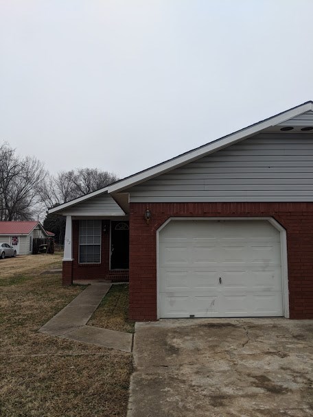 Nice 2 Bedroom 1 and 1/2 bath that comes with Dishwasher, Stove and fridge. Also has Washer and dryer hook ups. Has one car garage.