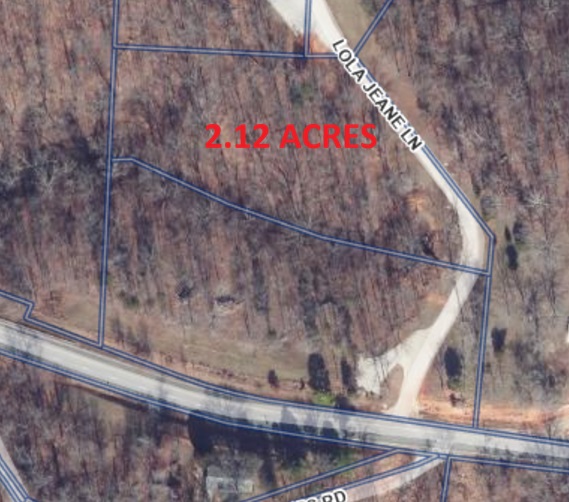 Build your dream home or business office just outside of town! Large 2.12 acre lot with Highway 12 frontage. Beautiful mature trees abound on this gorgeous lot only 5 minutes to downtown Rogers. Prairie Creek marina, Beaver Lake, biking trails and hiking trails are only minutes down the road. This property offers the ability to get "out of town" while still having the amenities of living in town. No HOA restrictions and water available at the street. Additional 2.57 acres available under MLS#1352098.