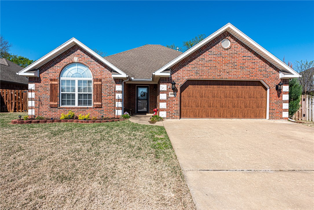 Don’t miss this opportunity! This all brick 3 bd 2 bath home with a covered entry and beautiful landscaping is just what you have been looking for!  Located in a the desirable Bellview Res. S/D near schools & the Razorback Greenway! Step inside & enjoy a tiled entry, open concept living w/ NEW laminate wood flooring, NEW light fixtures, a stacked stone fireplace, crown molding, & large windows full of natural light! Hosts guest in your open eat-in dining space with bay window or cook like a chef in the spacious L-shaped kitchen w/ SS apps (NEW dishwasher), NEW backsplash, granite counter tops, & abundant cabinetry! Hide away in your large private master bedroom with 2 deep tray ceiling accents or relax in your master bath with whirlpool tub, walk in shower, & with his&her sinks and vanity area! Enjoy 2 more spacious bedrooms & another full bathroom! Step onto the covered back patio with extension & a pergola! This space if perfect for enjoying guests or family in your private fully-fenced backyard! HURRY, act now!