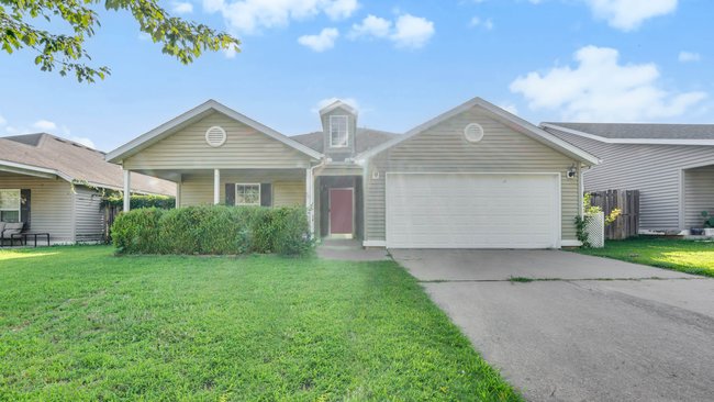 Nestled in West Fayetteville, this 3-bed, 2-bath home offers 1,526 square feet of an open floor plan with wood floors, a cozy living space, and an appliance package — including refrigerator, range, dishwasher, and microwave — so it's truly move-in ready. The real showstopper, though, is the backyard: it backs directly up to Holland Park, giving you a private walk-out into a green, tree-lined park right from your own property.
Built in 2007, the home sits in a prime location that keeps you connected to everything that matters. It's a 10-minute walk to John Colbert Middle School, a 4-minute drive to Jerry Williams Elementary, and just 10 minutes from Fayetteville High School and the University of Arkansas — making school runs, campus events, and Razorback game days effortless. Convenient & beautiful.
