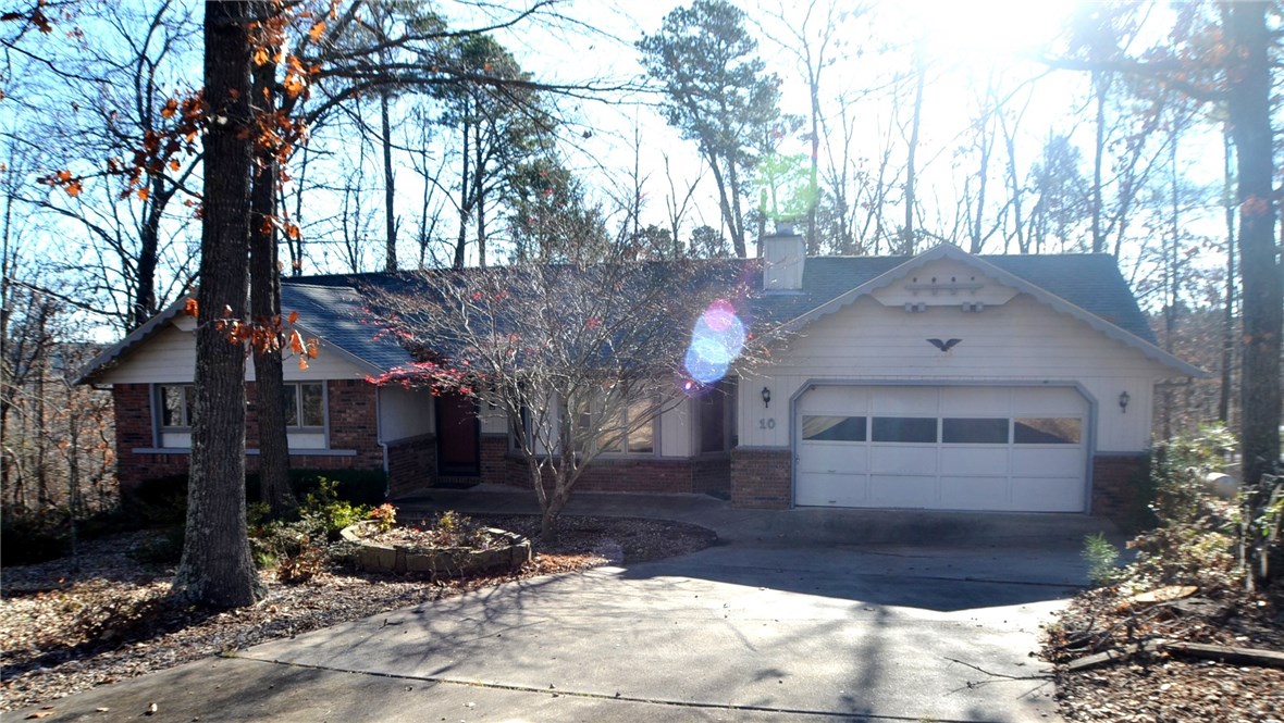 Nestled at the end of a cul-de-sac on .51-acre lot w/fenced back yard. Large rooms. FP in LR has gas log insert with wood-burning potential. Home needs carpet and paint. Home warranty provided through 2/10-Home Warranty. Newer roof. Solid home with lots of potential. 25' x 12' concrete pad in basement perfect for your workshop. Includes a Sunroom with lots of windows with wooded views that's not included in square footage. Priced to sell, so don't miss out. Inspections welcomed, but no repairs provided.