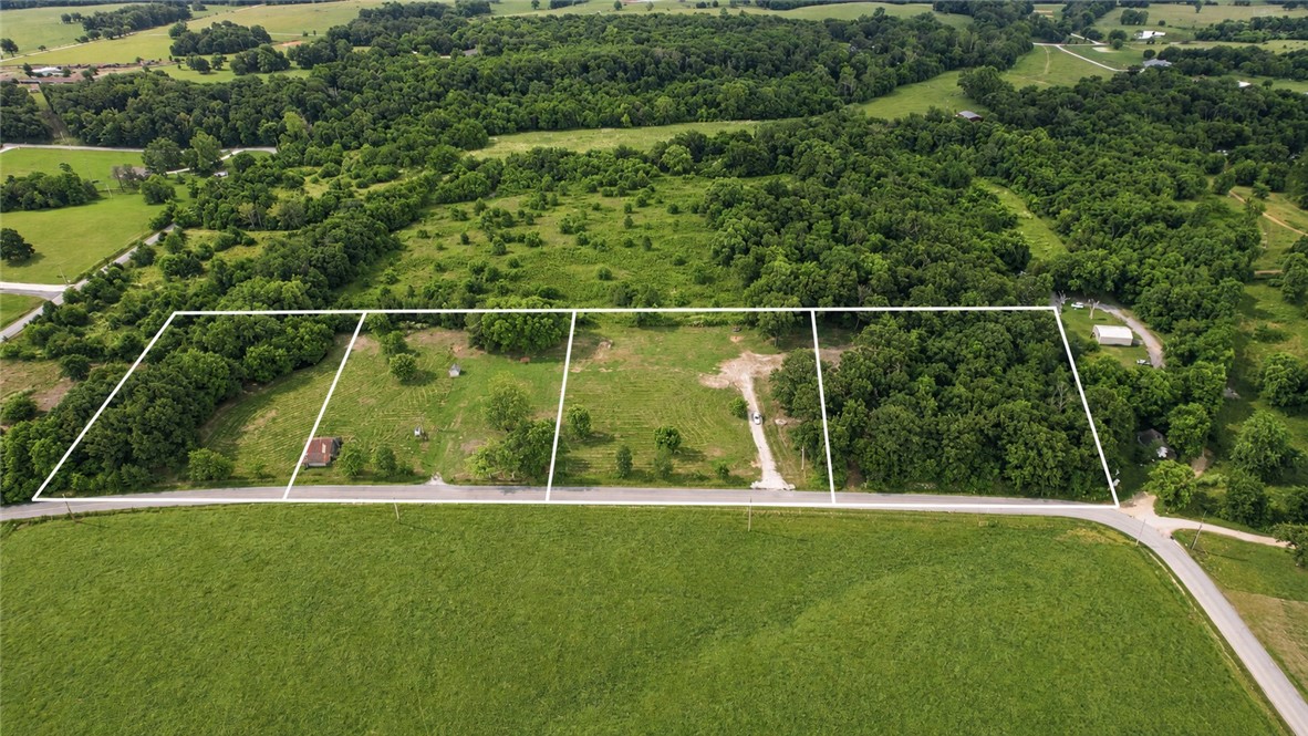 Estate-sized lots in Bentonville Schools! Build your dream home with room for a pool, shop, outdoor living space, and more—without the maintenance of large acreage. Lots have been perc tested and offer city water, electric, and paved road frontage. Conveniently located minutes from Highway 612, I-49, XNA, and all that Northwest Arkansas has to offer. Enjoy the perfect blend of privacy, space, and accessibility while creating the lifestyle you've been looking for.