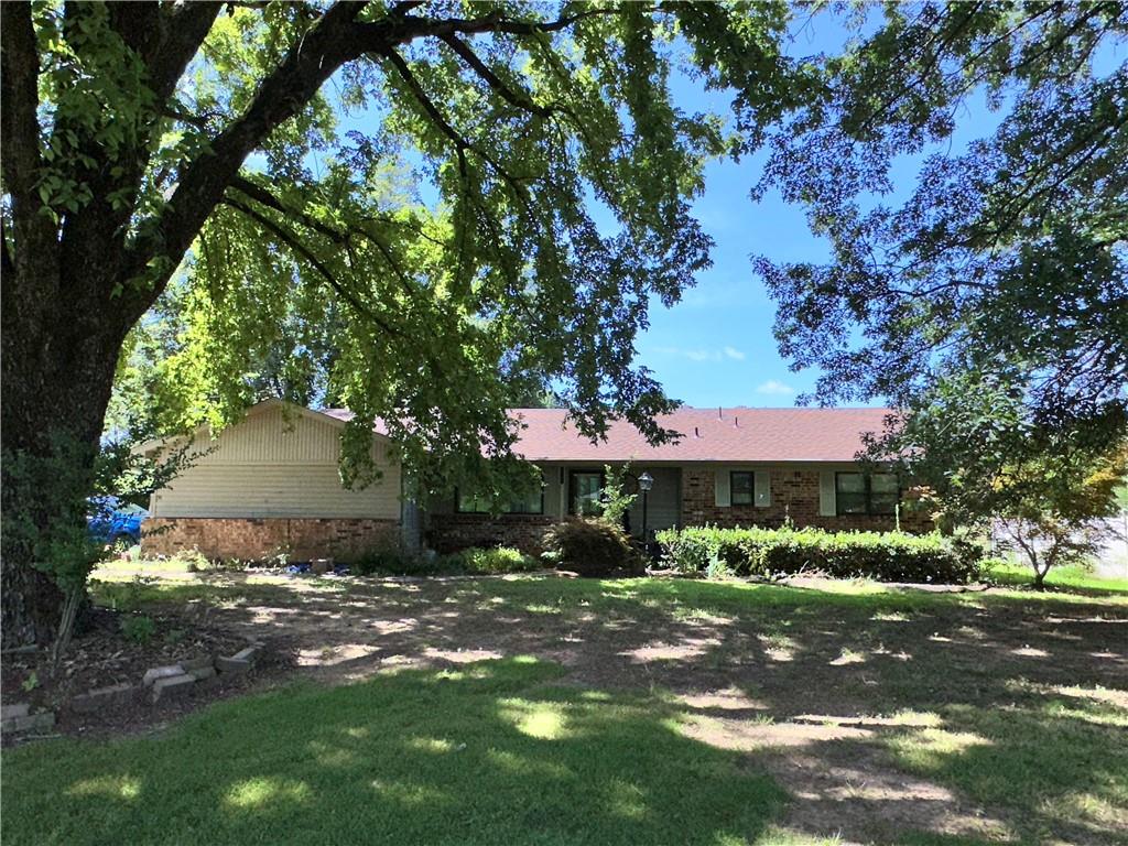 Check out the value for this large home!!! New roof less than 3 years old per owner! Large fenced back yard and room to enjoy from your covered patio!
Minutes from anywhere in Ozark and less than an hour from Alma, Fort Smith or Russellville, this charming nearly 1800 sf h/c 3/2 home features plenty of room to stretch out. Don't miss on this great deal!