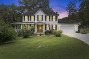 Imagine having the seclusion you desire and still only being minutes from shopping, entertainment, restaurants and more! This traditional-style home has functional living space for the entire family. From the moment you drive on to the property you are surrounded by the beautiful scenery of the Arkansas Hills. The inviting wrap-around porch says come stay awhile, relax and enjoy. Inside find charm and character from the fireplace in the formal dining room to the fireplace in the main living area to the third fireplace in the basement family room. The kitchen boasts plenty of counter space and a pantry for all your baking needs. Step out onto the covered deck to enjoy grilling with friends or lounge around in your 33-foot pool. Upstairs find four bedrooms and two baths with ample sunlight a