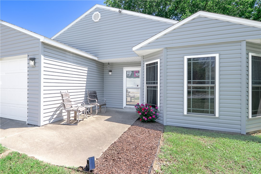 Welcome to 1210 Spring Street, where convenience meets comfort in one of Bentonville's most accessible
locations! This well-loved 3-bedroom, 2-bath home offers 1,255 square feet of thoughtfully designed living
space, perfect for first-time buyers or savvy investors. Situated in the desirable Dogwood Place subdivision
just off exit 88A, you're mere minutes from the new Walmart campus and everything Northwest Arkansas
has to offer. The home has been lovingly maintained with recent updates including a new roof and siding
in 2023, updated flooring in 2024, and a brand-new dishwasher. The kitchen is a standout feature
with Corian counters, tons of storage, and a convenient pantry. Step outside to your private backyard
oasis, complete with mature shade trees and wood privacy fencing—ideal for summer gatherings or quiet
mornings with coffee. With its attached 2-car garage, covered patio, and proximity to biking trails, parks,
and schools, this home is ready for you to write your next chapter!