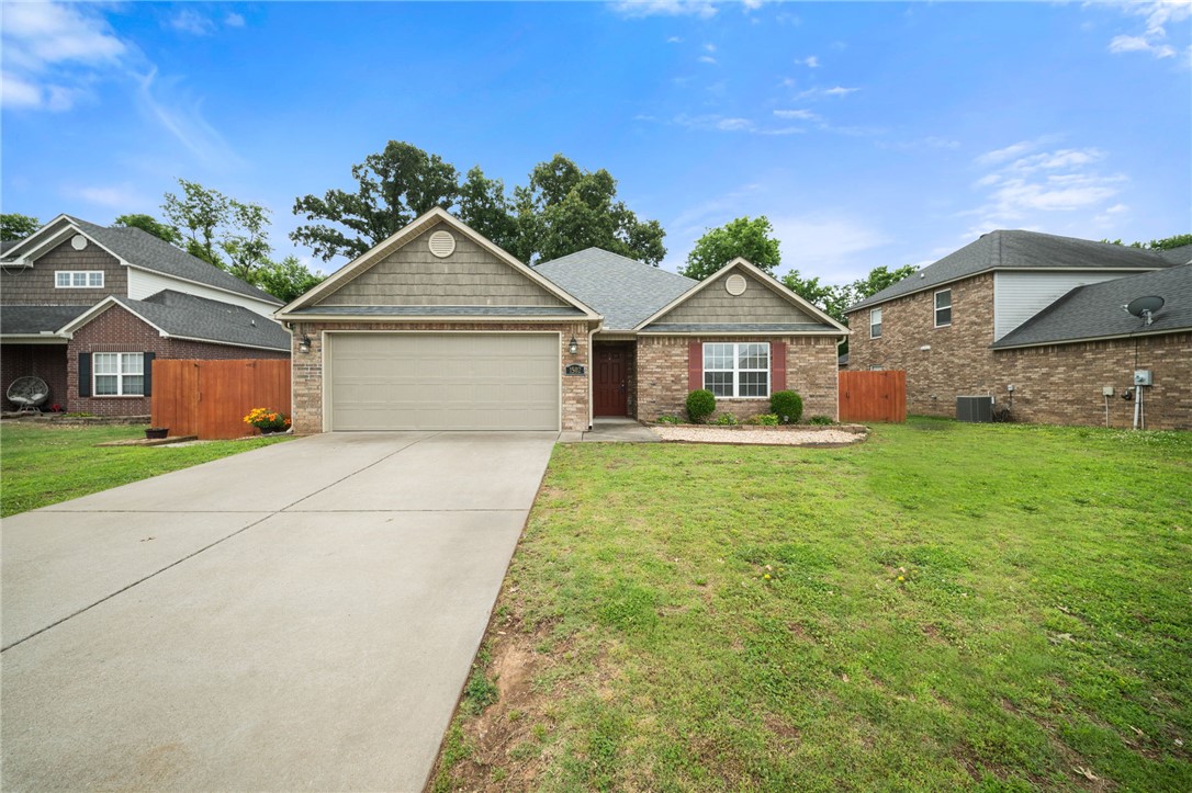 New Roof 2024!  Welcome to 1502 W Kelley Drive, a beautifully maintained 3 bedroom, 2 bath home located in the heart of Rogers! Built in 2017, this move in ready home offers the perfect blend of modern comfort, functional design, and convenient access to everything Northwest Arkansas has to offer.
Inside, you’ll find an open concept layout with spacious living areas and a kitchen that flows seamlessly into the main living space and features ample cabinetry, generous counter space, and a welcoming dining area. The primary suite and en suite bath are spacious, while two additional bedrooms offer flexibility for sleeping, home gym, or home office.  Enjoy low maintenance living with a fully fenced backyard with fish pond, covered/enclosed patio, storage shed, and attached two-car garage.
Conveniently situated near schools, shopping, dining, parks, and major commuter routes, this home combines neighborhood charm with everyday convenience.