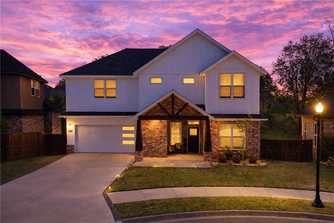 LOCATION!! Welcome to this beautifully crafted two-story home blending modern design with everyday comfort. Offering 3 spacious bedrooms, 2.5 bathrooms, and approximately 2,501 sq ft, this home is perfect for both relaxing and entertaining.
Enjoy exceptional curb appeal with a stylish brick and siding exterior, charming covered front porch with wood beam accents, and a landscaped yard. Inside, the bright open-concept layout is filled with natural light from energy-efficient windows and features seamless flow between living spaces.
Highlights include a fully insulated 2-car garage, extended driveway, private fenced backyard and peaceful green space behind the home. Additional upgrades include a whole-house vacuum system, laundry chute, integrated accent lighting throughout, coffered ceilings and quartz countertops.
Located in a desirable neighborhood near shopping, dining, Coler Mountain Bike Preserve and Bentonville Square. Walking distance to Bentonville schools. Move-in ready and low maintenance!