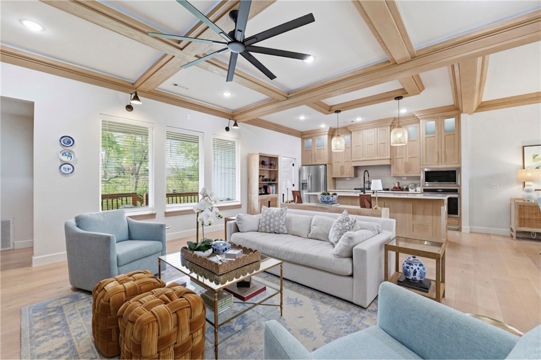 Welcome to this beautifully crafted two-story home blending modern design with everyday comfort. Offering 3 spacious bedrooms, 2.5 bathrooms, and approximately 2,501 sq ft, this home is perfect for both relaxing and entertaining.
Enjoy exceptional curb appeal with a stylish brick and siding exterior, charming covered front porch with wood beam accents, and a landscaped yard. Inside, the bright open-concept layout is filled with natural light from energy-efficient windows and features seamless flow between living spaces.
Highlights include a fully insulated 2-car garage, extended driveway, private fenced backyard and peaceful green space behind the home. Additional upgrades include a whole-house vacuum system, laundry chute, integrated accent lighting throughout, coffered ceilings and quartz countertops.
Located in a desirable neighborhood near shopping, dining, Coler Mountain Bike Preserve and Bentonville Square. Move-in ready!