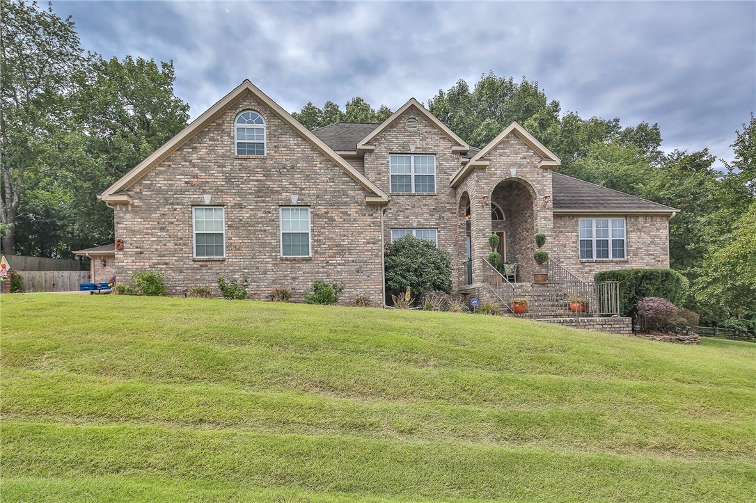 Great floor plan w/ 4 bedroom, 4.5 baths, 2 living rooms, 2 bonus/media rooms, office, & formal dining! 2nd Bonus room on lower level has full bath & wired for surround - can double for 2nd master bedroom. Great usable backyard w/ covered patio, newly installed stonework, Fescue grass, irrigation, & landscaping. Spacious kitchen that opens up to family room (Propane FP with blower & electric start). Dogwood Hills GC across the street w/ access. Spacious bedrooms on 2nd level with bonus & 2 full baths.