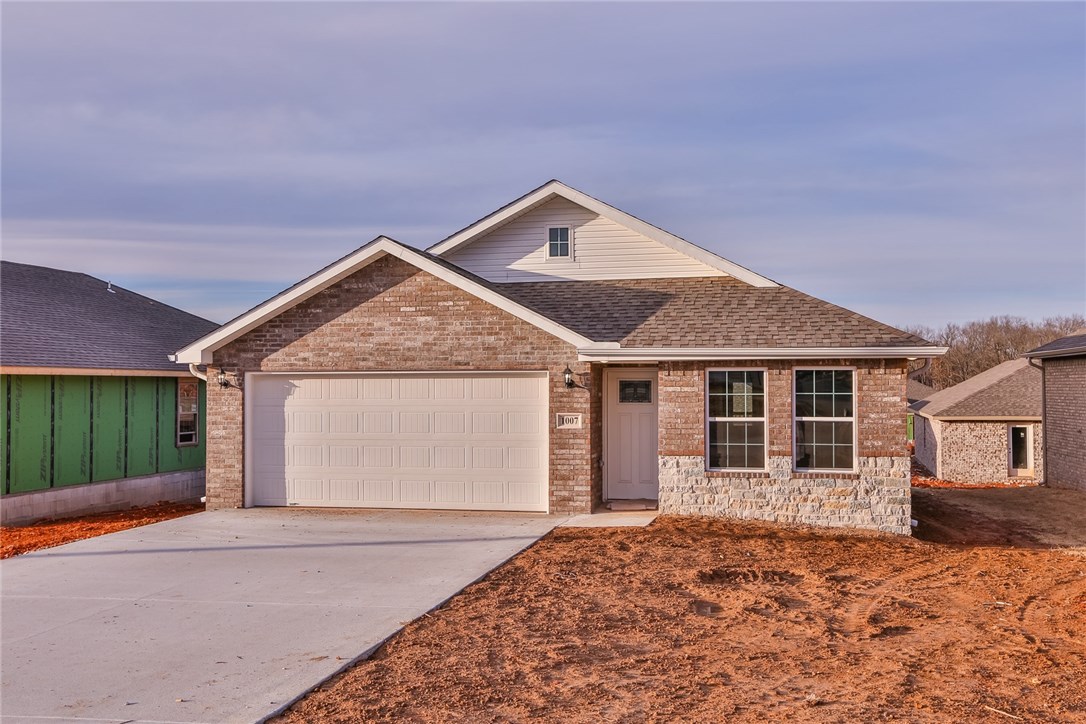 Enjoy an open living, dining and kitchen space in this brand new four bedroom, two bathroom plan series. With a spacious master suite, including a walk-in closet and a double vanity in the master bath, comfort will never be compromised in the 1400-4 Series. The utility room is conveniently nestled among bedrooms, making laundry less of a hassle, and the extended living room is perfect for having guests over. Extended living room, sodded yard, beautiful hardwood floors, and exterior downlights.