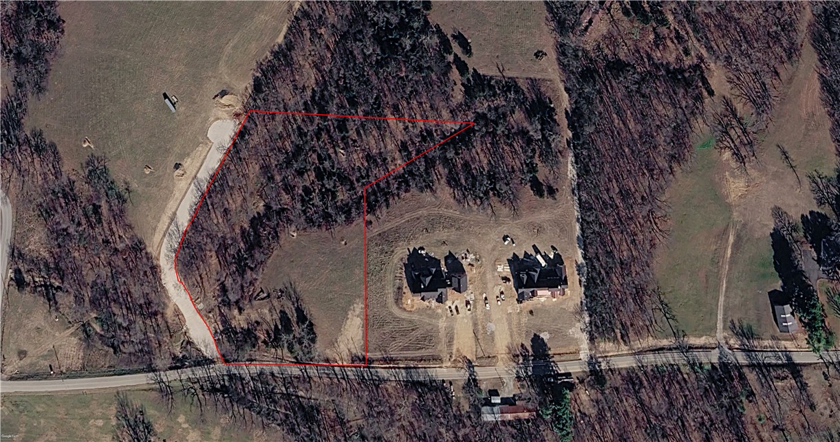Rare opportunity to own a beautiful 5.75-acre residential lot in Fayetteville. Offering a spacious setting with a blend of privacy and natural surroundings, this property provides an ideal location to build your custom home. Enjoy the peaceful feel of country living while remaining conveniently close to shopping, dining, schools, and everyday amenities in Fayetteville. With ample space for your dream home and outdoor living areas, this exceptional homesite is ready for your vision.