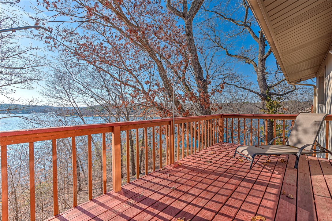 DISCOVER THE ENDLESS POTENTIAL OF LAKEFRONT LIVING! Nestled on the shores of beautiful Lake Windsor on a sprawling .72 acre lot, this spacious 4,058 sq ft home offers 4 bedrooms, 3.5 bathrooms, and an abundance of features to accommodate your lifestyle. Step inside to find an inviting layout complete with a finished, walk-out basement, a cozy second living room, and an expansive storage area perfect for all your storage needs. The home’s location is ideal for outdoor enthusiasts and relaxation seekers alike. Enjoy proximity to scenic trails, world-class golf, a serene park, and a variety of restaurants. Whether you're dreaming of creating a modern oasis or enjoying the charm of the current space, this property is brimming with possibilities to make it your own. Schedule your tour today and imagine the lakefront life you've always wanted!