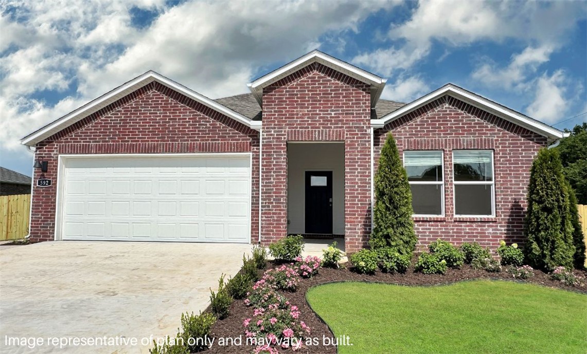 Exquisite Elgin Plan in Wagon Wheel Phase 2, in Farmington, Arkansas! Each home in Wagon Wheel is meticulously crafted with attention to detail, creating a space that feels both luxurious and welcoming. From the moment you walk through the door, you'll be greeted by modern features and spacious a layout that caters to every lifestyle. Our homes boast premium finishes and thoughtful designs, ensuring that you'll be stepping inside your own personal oasis. These homes will be complete with LVP flooring throughout and wood shelving in all closets, pantry and utility room. The kitchen will have quartz kitchen counters, 36-inch cabinets, and stainless-steel appliances! Home will have a Garage Door Opener. Primary bath will have quartz countertops, double sinks, and an oversized walk-in shower. Each home comes with 4-sided brick with siding per plan. NO SHUTTERS. Taxes and Parcel TBD.